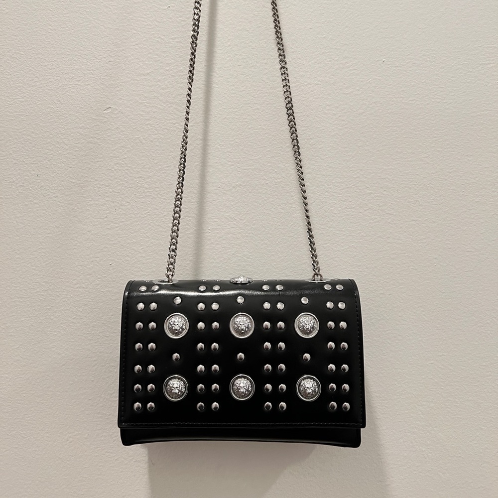 cool black bag with silver lion design